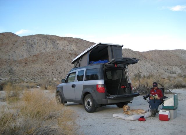 A pop-top for a Honda Element! No cutting - it uses the sunroof as access.